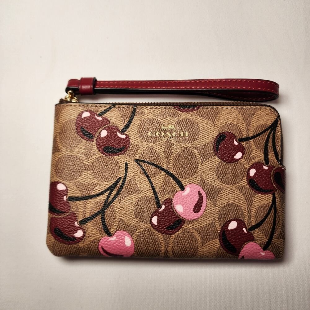 NWT Coach CZ450 Corner Zip Wristlet Signature Canvas Cherry Print Tan Multi v1 - Picture 1 of 3